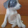 Royal Copenhagen siddende hundehvalp
