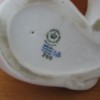 Royal Copenhagen siddende hundehvalp